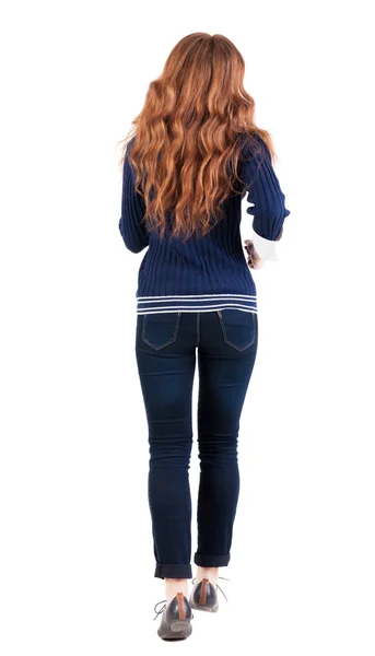 Back view of jumping woman in jeans. — Stock Photo, Image