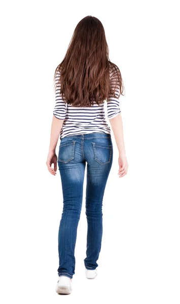 后步行女子在牛仔裤的视图 . — 图库照片