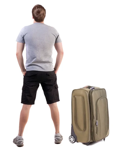 Widok podróży człowiek z walizką, patrząc z tyłu. — Zdjęcie stockowe