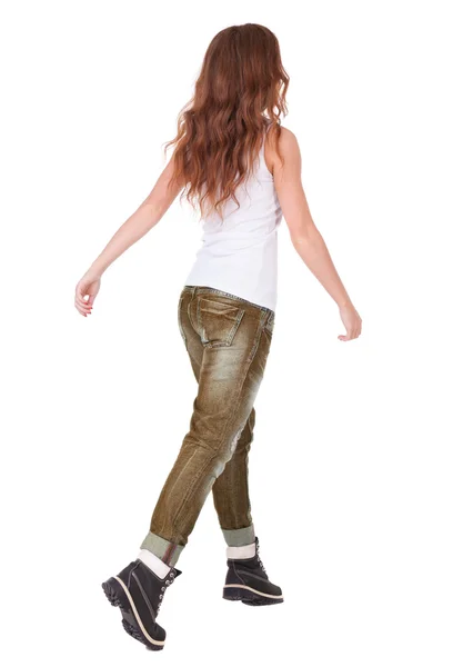 Rückansicht des springen Frau in jeans. — Stockfoto