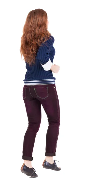 Back view of jumping woman in jeans. —  Fotos de Stock