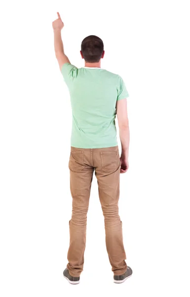 Bakifrån pekar unga män i skjorta och jeans. — Stockfoto