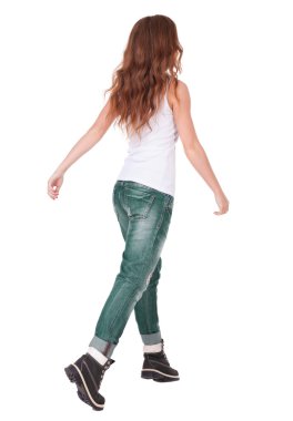 Arkadan görünüş-Jeans kadın atlama.