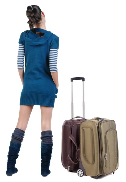 Vue arrière du voyage femme brunette avec valise — Photo