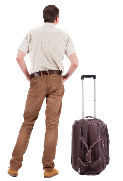Achteraanzicht van busness man met koffer reizen — Stockfoto