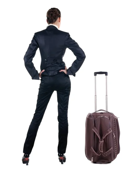 Back view of traveling business woman with suitcas — Stock Photo, Image
