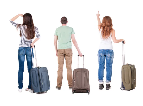 Back view of group with suitcase — Stock Photo, Image