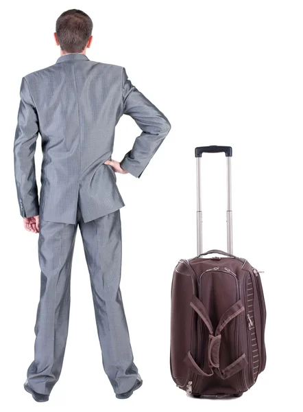 सूटकेस के साथ यात्रा व्यवसायी आदमी का बैक व्यू — स्टॉक फ़ोटो, इमेज