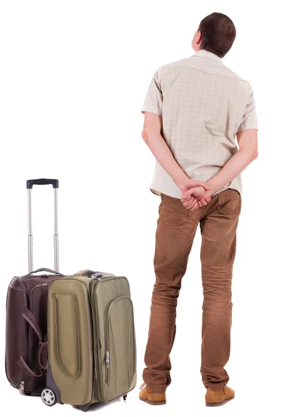 旅行のスーツケースを持つ望ましく男の背面図 — ストック写真