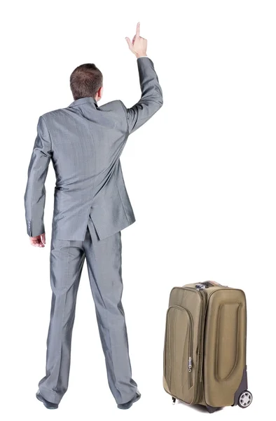 Visão de homem de negócios com mala apontando a viajar de volta. — Fotografia de Stock
