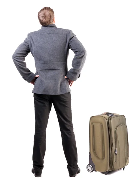 सूटकेस के साथ यात्रा व्यवसायी आदमी का बैक व्यू — स्टॉक फ़ोटो, इमेज
