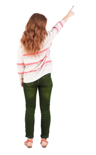 Back view of pointing woman. — Stock Photo, Image