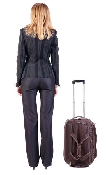 Vista posterior de la mujer de negocios con maleta de viaje —  Fotos de Stock