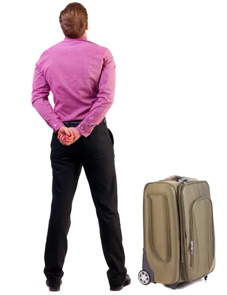 Vista do homem da Secretaria com mala de viagem de volta — Fotografia de Stock