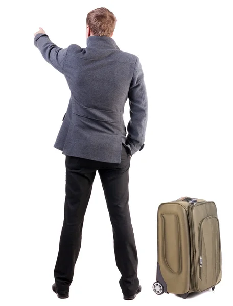 Rückansicht des Reisens Geschäftsmann mit Koffer. — Stockfoto