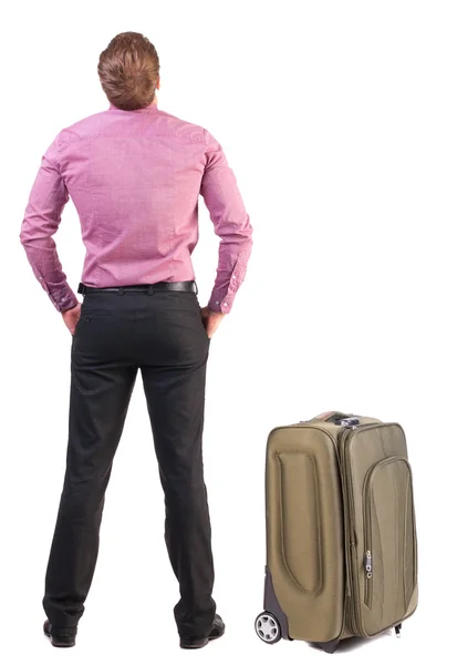 Vista do homem da Secretaria com mala de viagem de volta — Fotografia de Stock