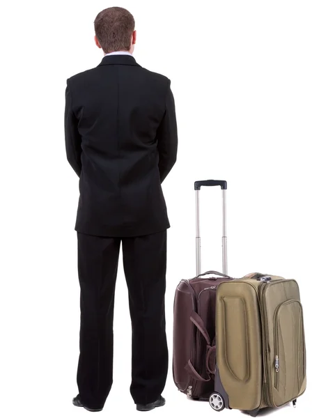 Achteraanzicht van busness man met koffer reizen — Stockfoto