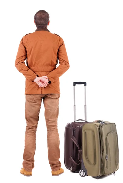 Vista posterior de hombre de negocios con maleta de viaje —  Fotos de Stock