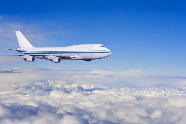 Avión de pasajeros en las nubes . — Foto de Stock