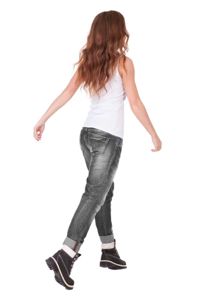 Back view of jumping woman in jeans. —  Fotos de Stock