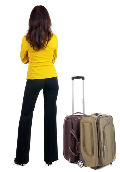 Vista posterior de la mujer de negocios con suitcas de viaje —  Fotos de Stock