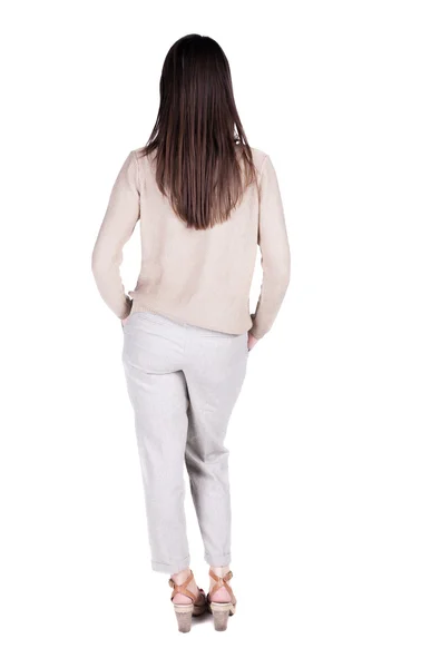 Back view of standing young beautiful brunette woman. — Stock Photo, Image