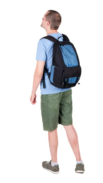 Rückansicht des Mann mit Rucksack nachschlagen. — Stockfoto