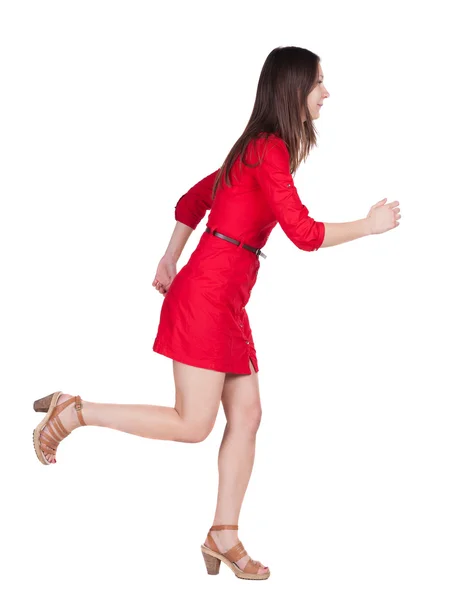 Vista di running donna in abito posteriore. — Foto Stock