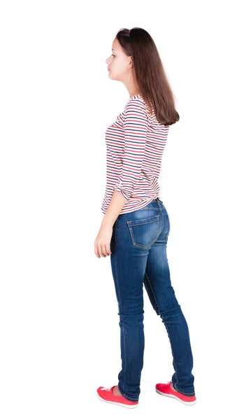 立っている若いブルネット美女の背面図. — ストック写真
