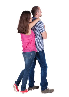 genç bir çift duvara dönük arkadan görünüş (kadın ve erkek).