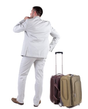 valiz görünmüyor ile şok iş adamı görünümünü geri.