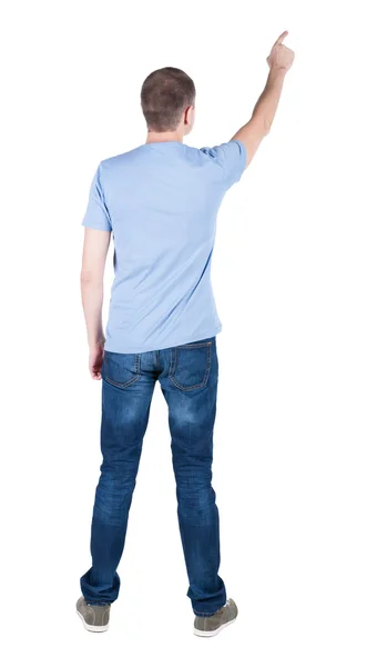 Bakifrån pekar unga män i skjorta och jeans. — Stockfoto