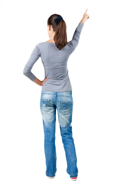 Back view of pointing woman. — Stock Photo, Image