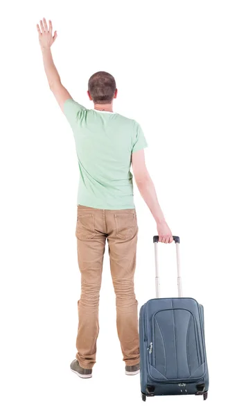 Back view of man with suitcase. — Stock Photo, Image