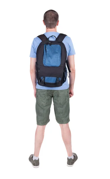 Back view of man with backpack looking up. — Stock Photo, Image