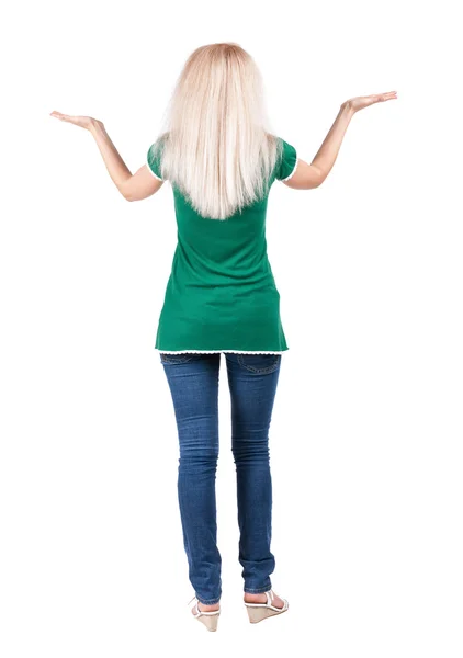 Vista posterior de una mujer feliz en jeans — Foto de Stock