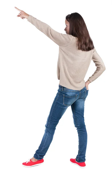 Back view of pointing woman. — Stock Photo, Image