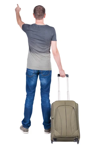 スーツケースを持つ男の背面図. — ストック写真