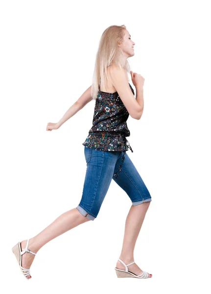 Back view of running woman. beautiful blonde girl in motion. — Stock Photo, Image