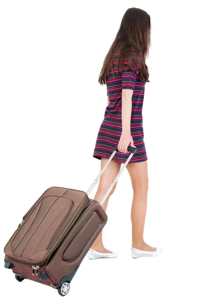 Vista posterior de poca mujer con maleta — Foto de Stock