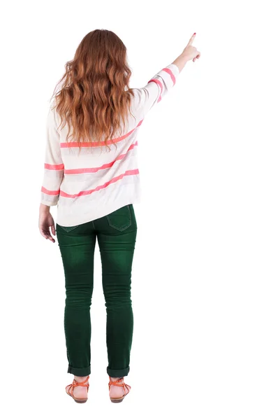 Vista posteriore della donna che punta . — Foto Stock