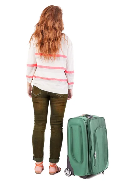 Vista posterior de poca mujer con maleta. —  Fotos de Stock
