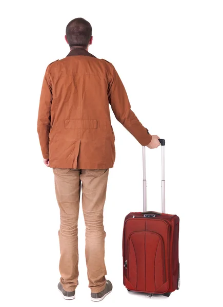 Achteraanzicht van stijlvol geklede man in een bruin jackett met pak — Stockfoto