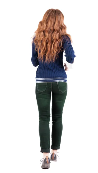 Back view of jumping woman in jeans. —  Fotos de Stock