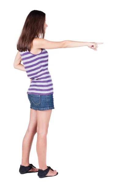 Vista posteriore della donna che punta . — Foto Stock