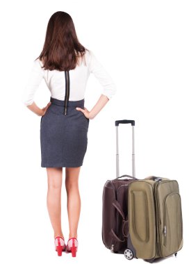 Arkadan görünüş iş kadını ile bavul seyahat.