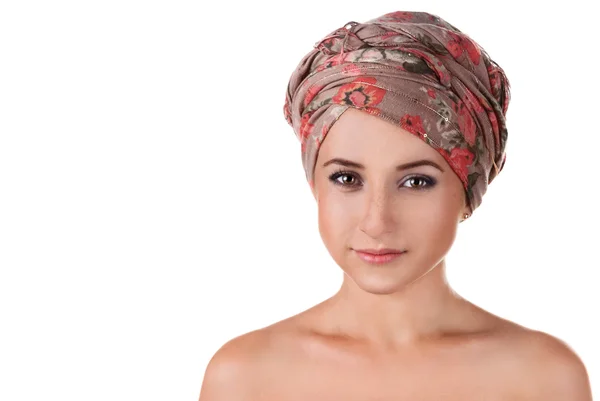 Portrait of white-skinned girl in a turban. — Stock Photo, Image