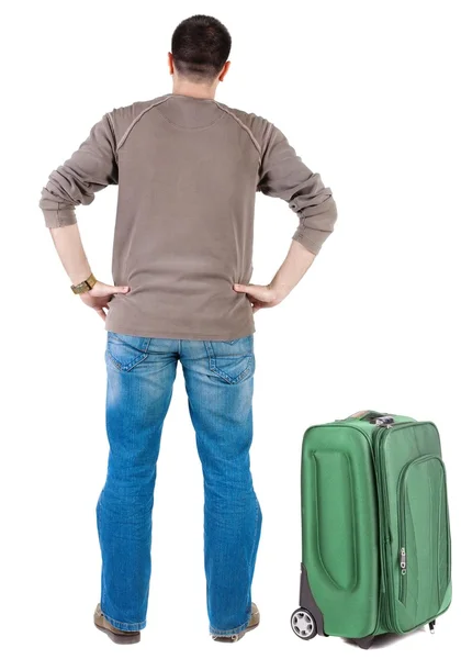 Мандрівний молодий чоловік з валізою — стокове фото