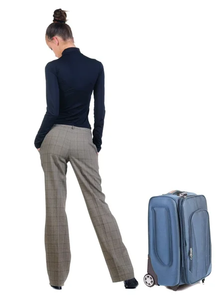 Triest jonge vrouw met koffer reizen . — Stockfoto