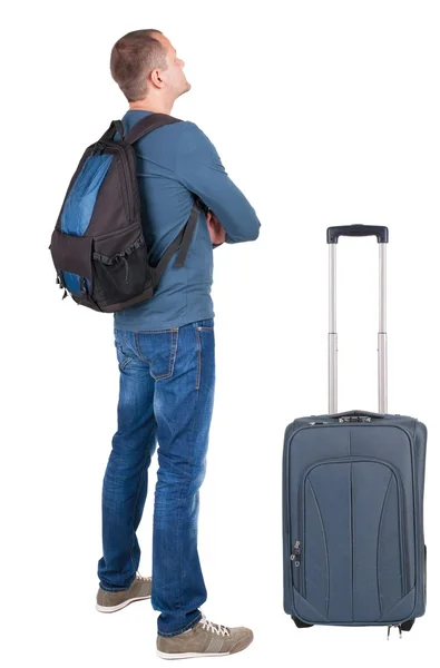 Pohled zezadu na člověka s fotografický batoh, vyhledávání — Stock fotografie